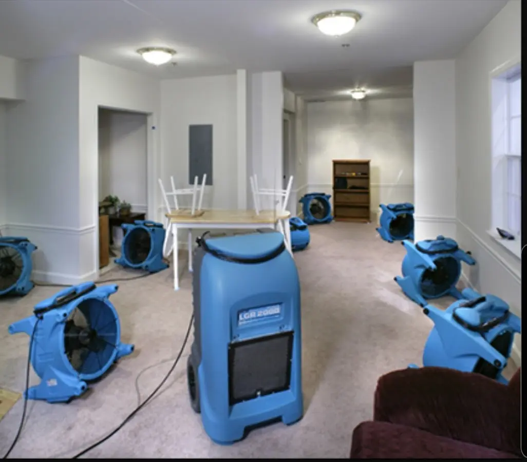 Air movers and dehumidifier setup for Water Damage Restoration in East Ridge